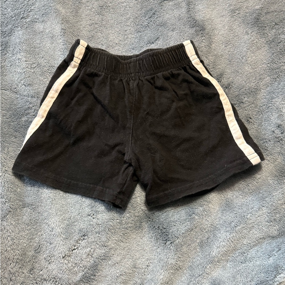 Place Black Shorts with White Accents
